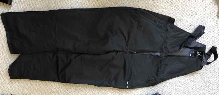 my snow bib laid out on the floor